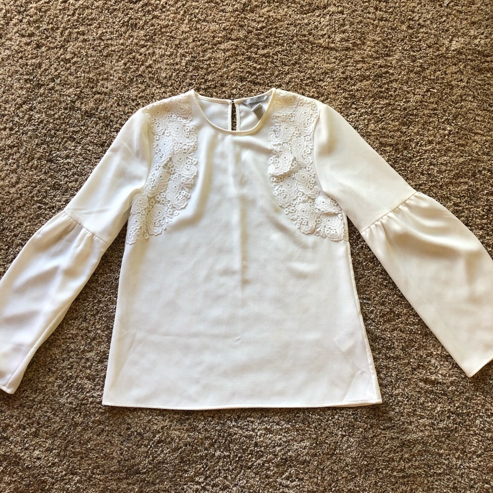 White blouse with lace detail